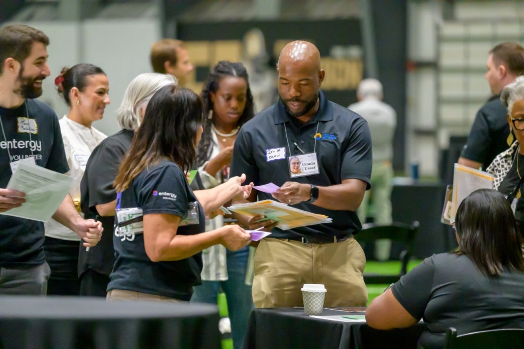 Volunteers at poverty simulation