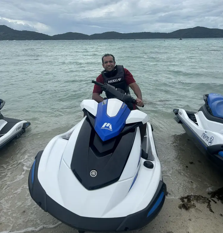 Harsh at shore, sitting on a water ski