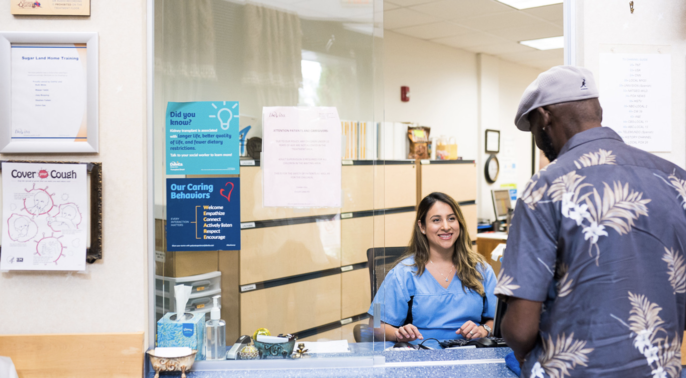 person speaking with a nurse