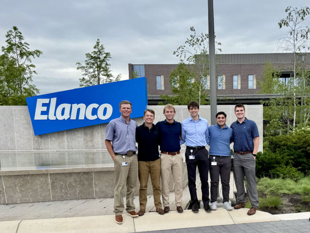 Group standing in front of Elanco 