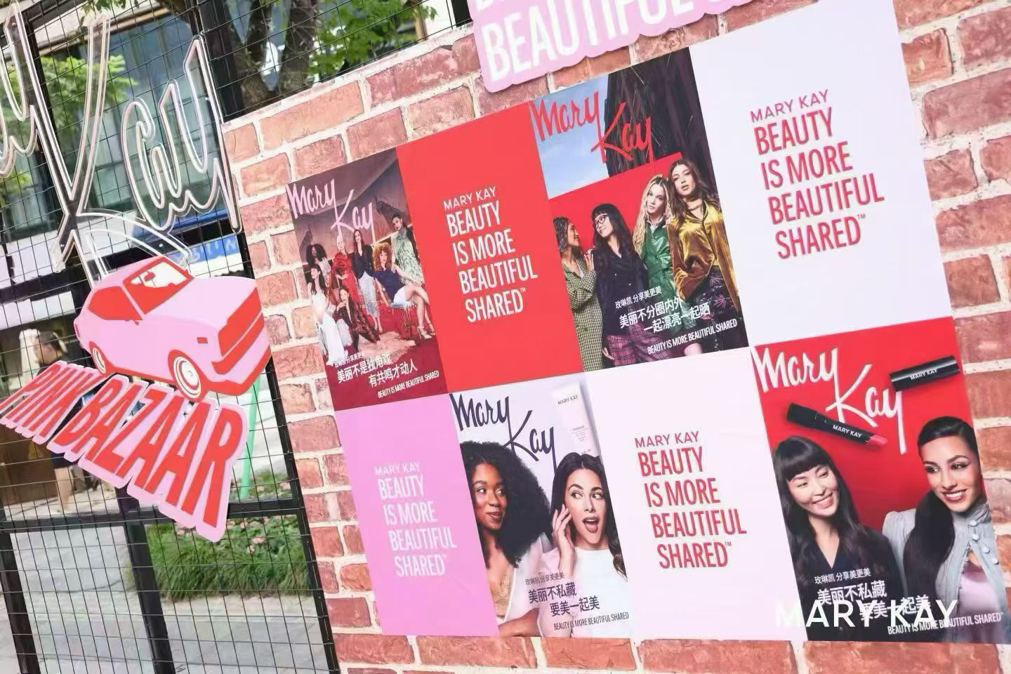 Mary Kay signs on a brick wall