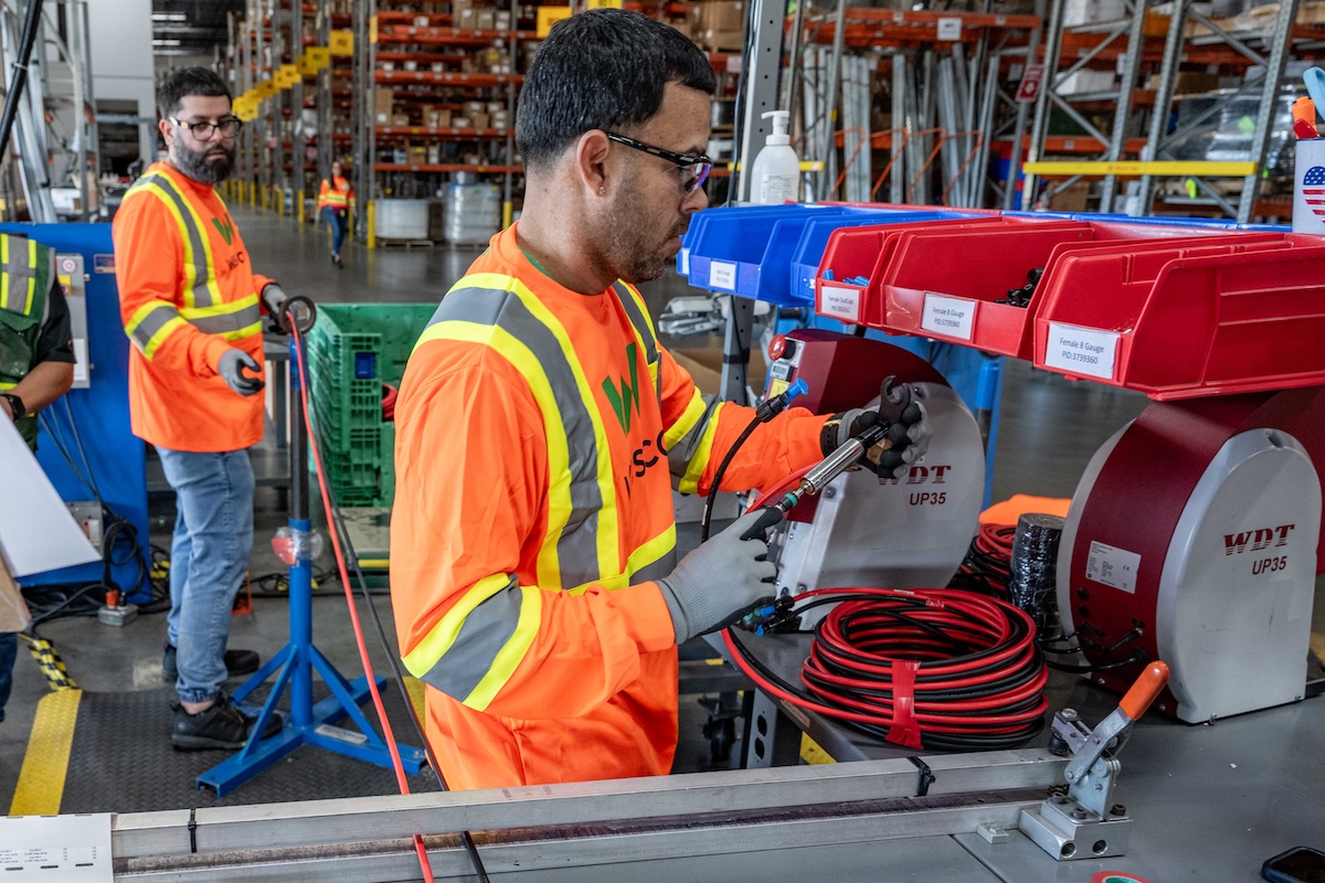 Wesco Team Members working safely in the warehouse facility.