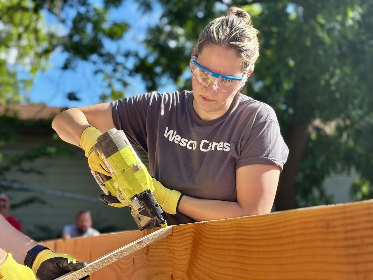 Wesco employee working at Habitat for Humanity site.