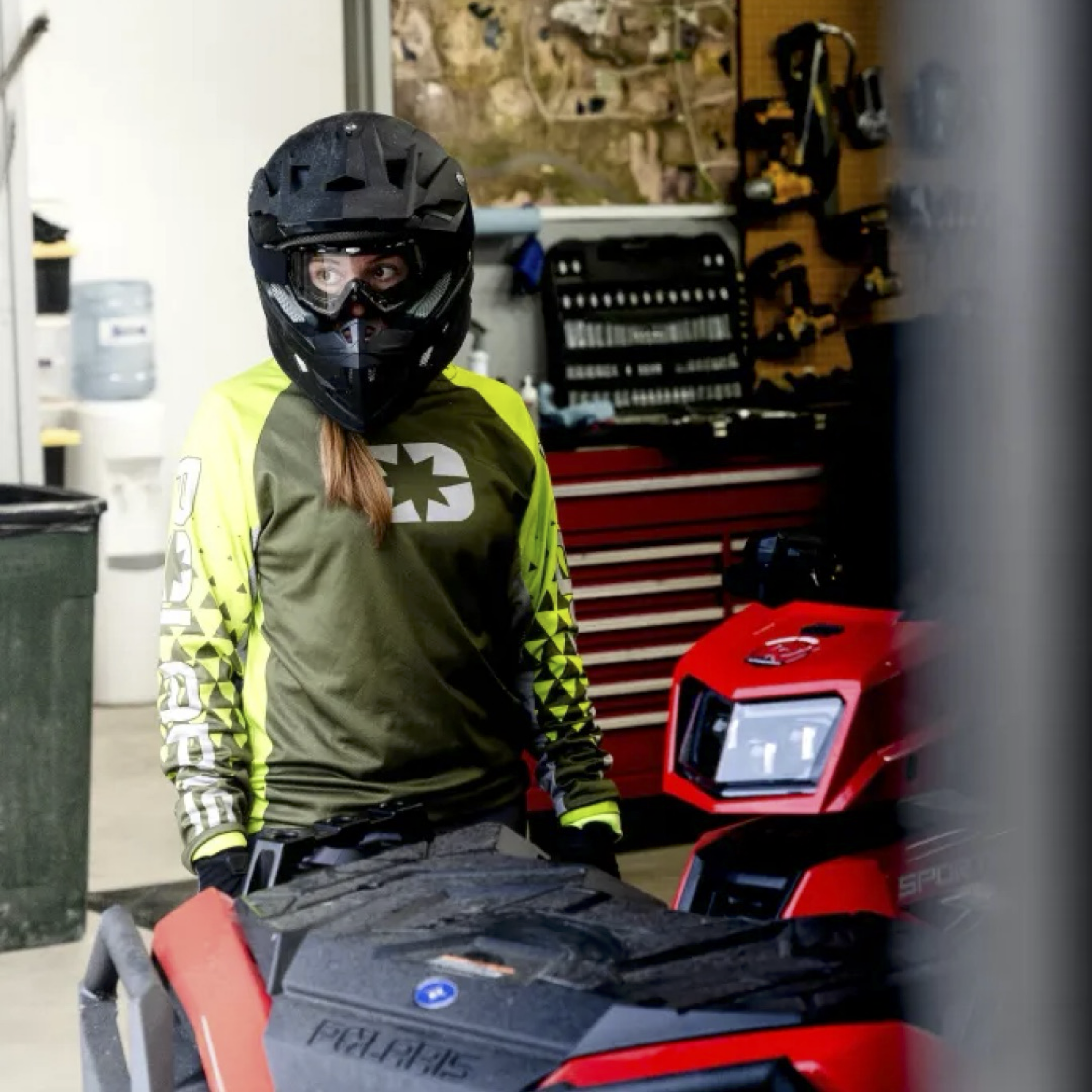 Woman in helmet on ATV