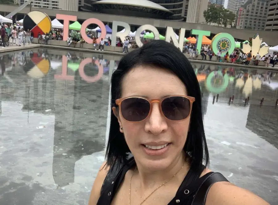 Diana Lopera in front of TORONTO sign