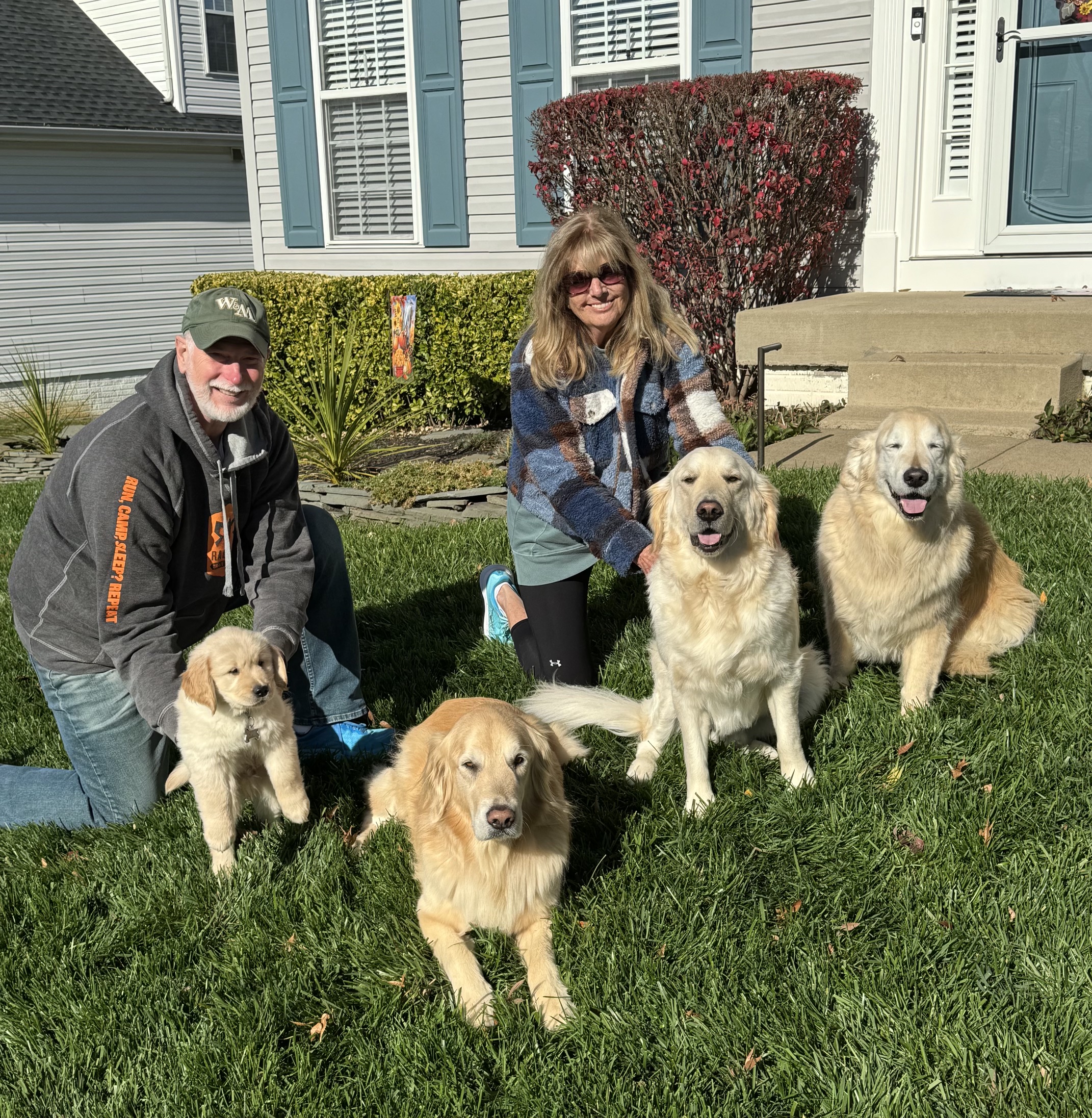 Todd Repass Jr., his wife, and their dogs.