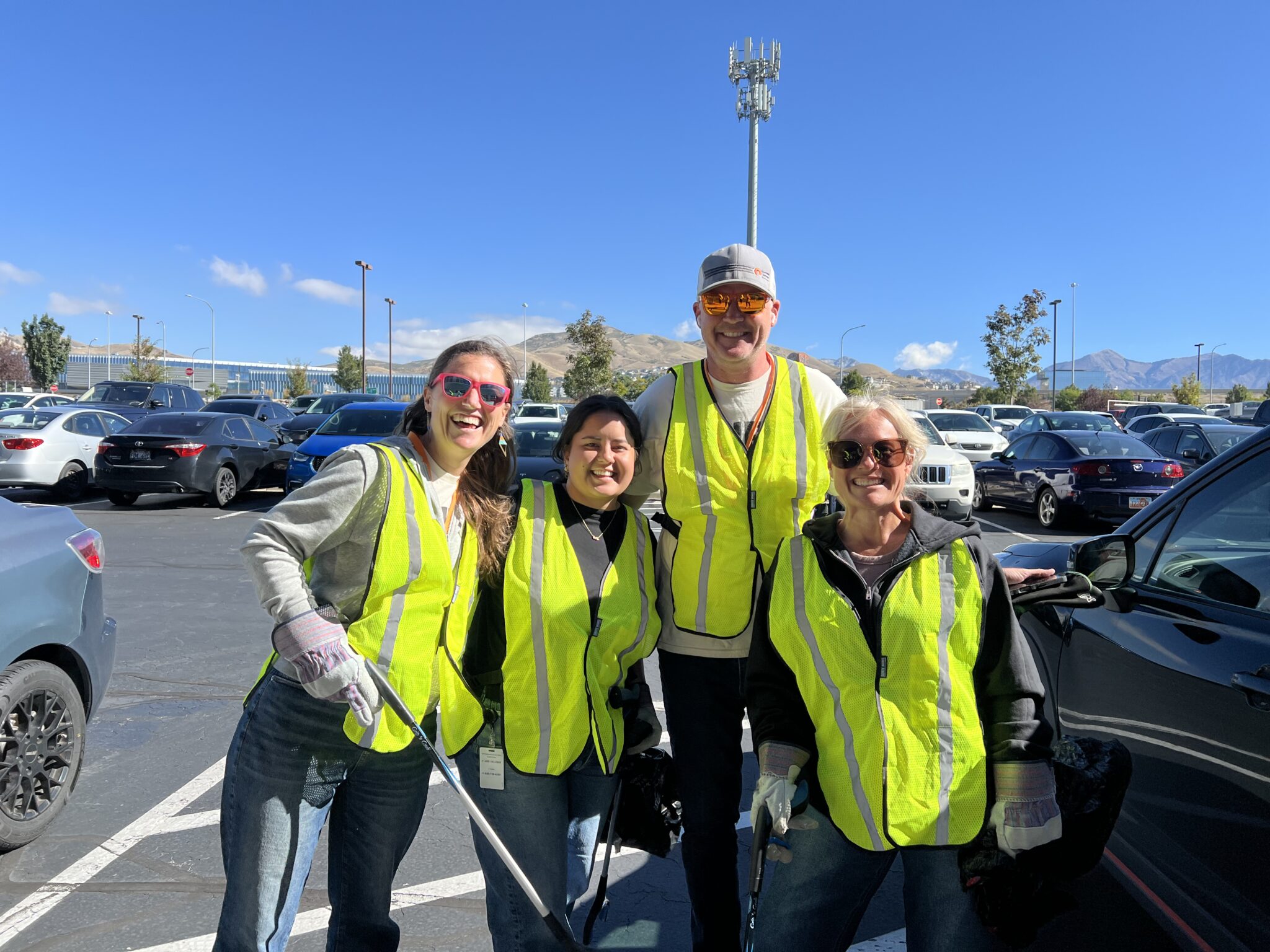 Group photo of volunteers collecting trash