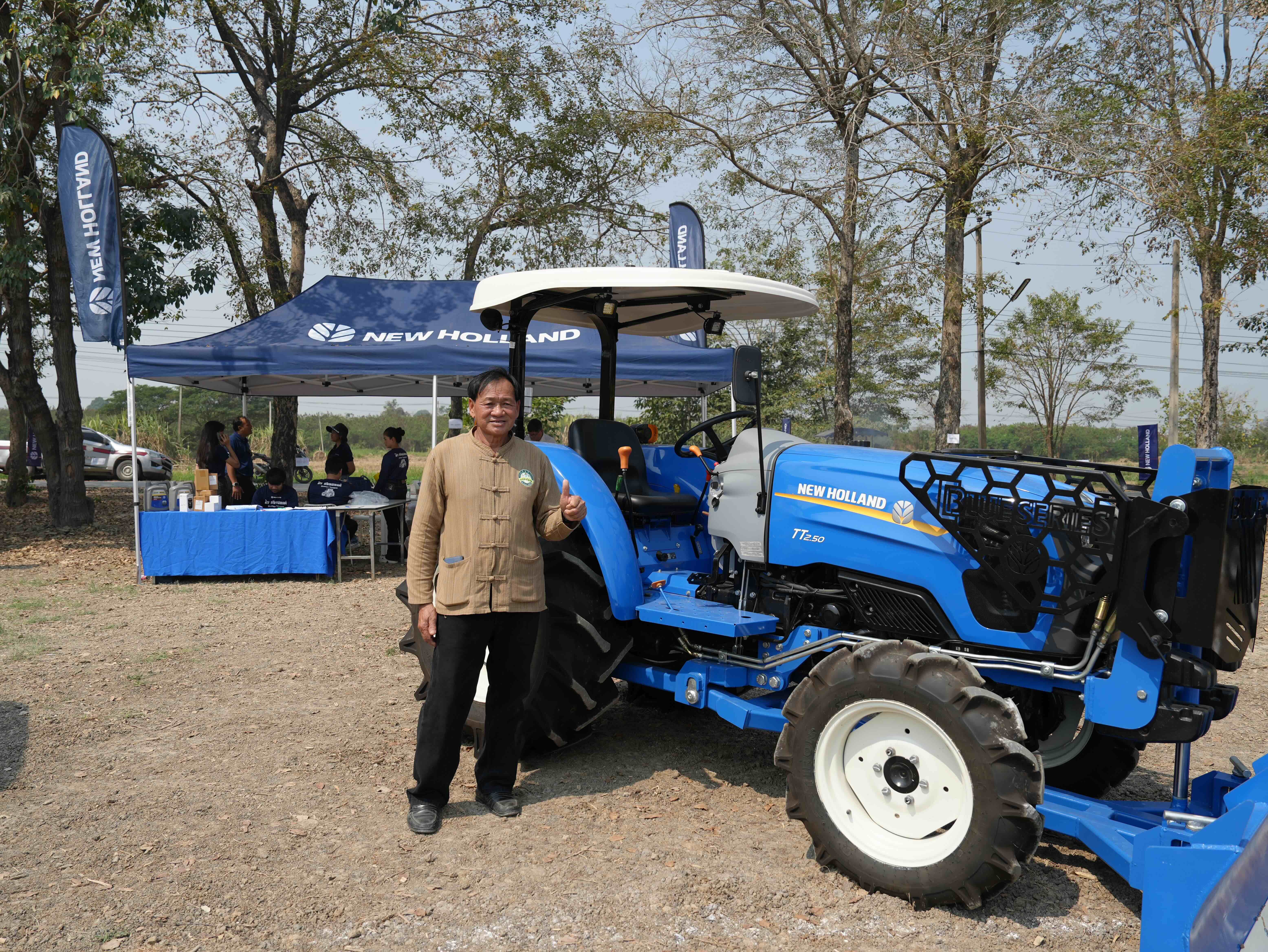 rice farmer next to machines