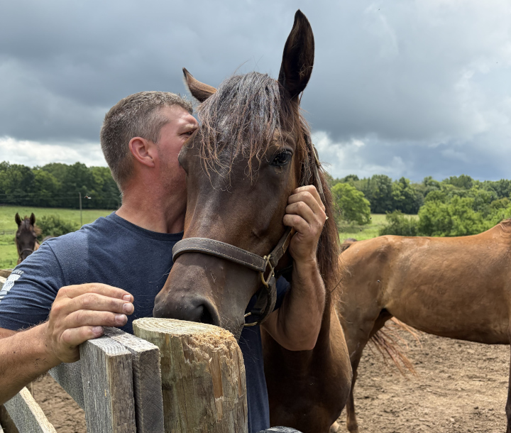 Dan with Izzy, who has the "same temperament as Eeyore from 'Winnie the Pooh.'"