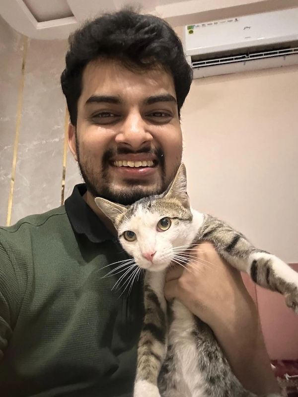 Devavshish and his cat.
