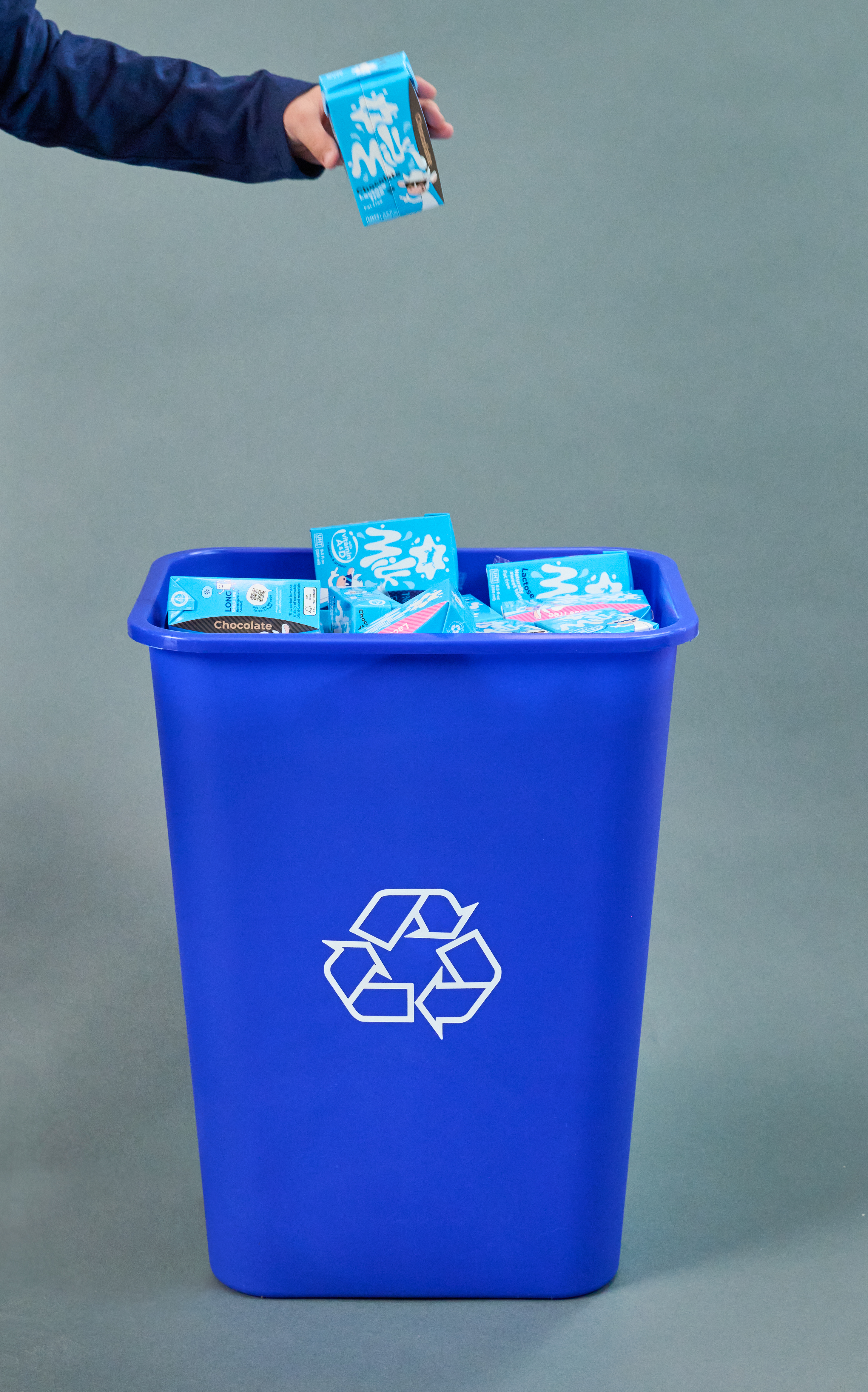 Tetra Pak cartons being recycled in blue bin