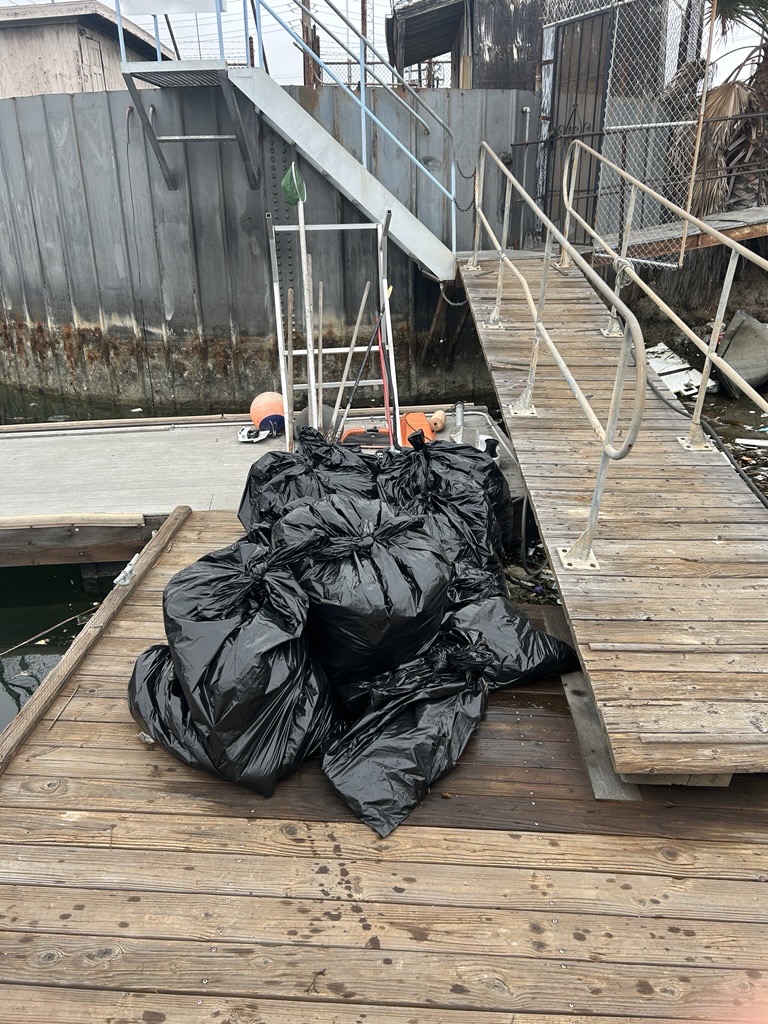 pile of full trash bags
