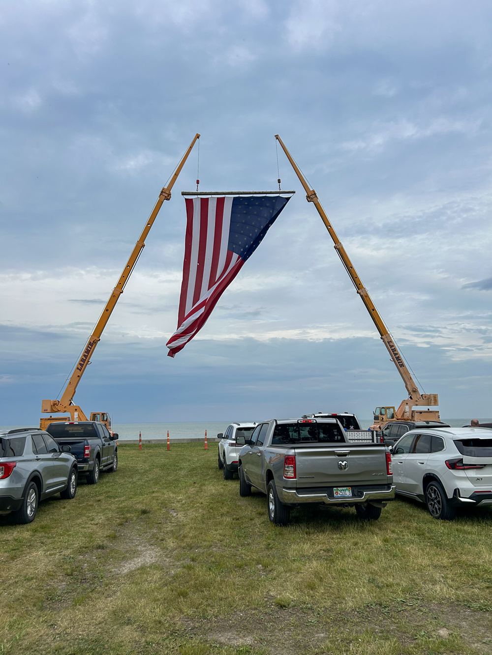 A large flag was hung for the event at Lake Erie.