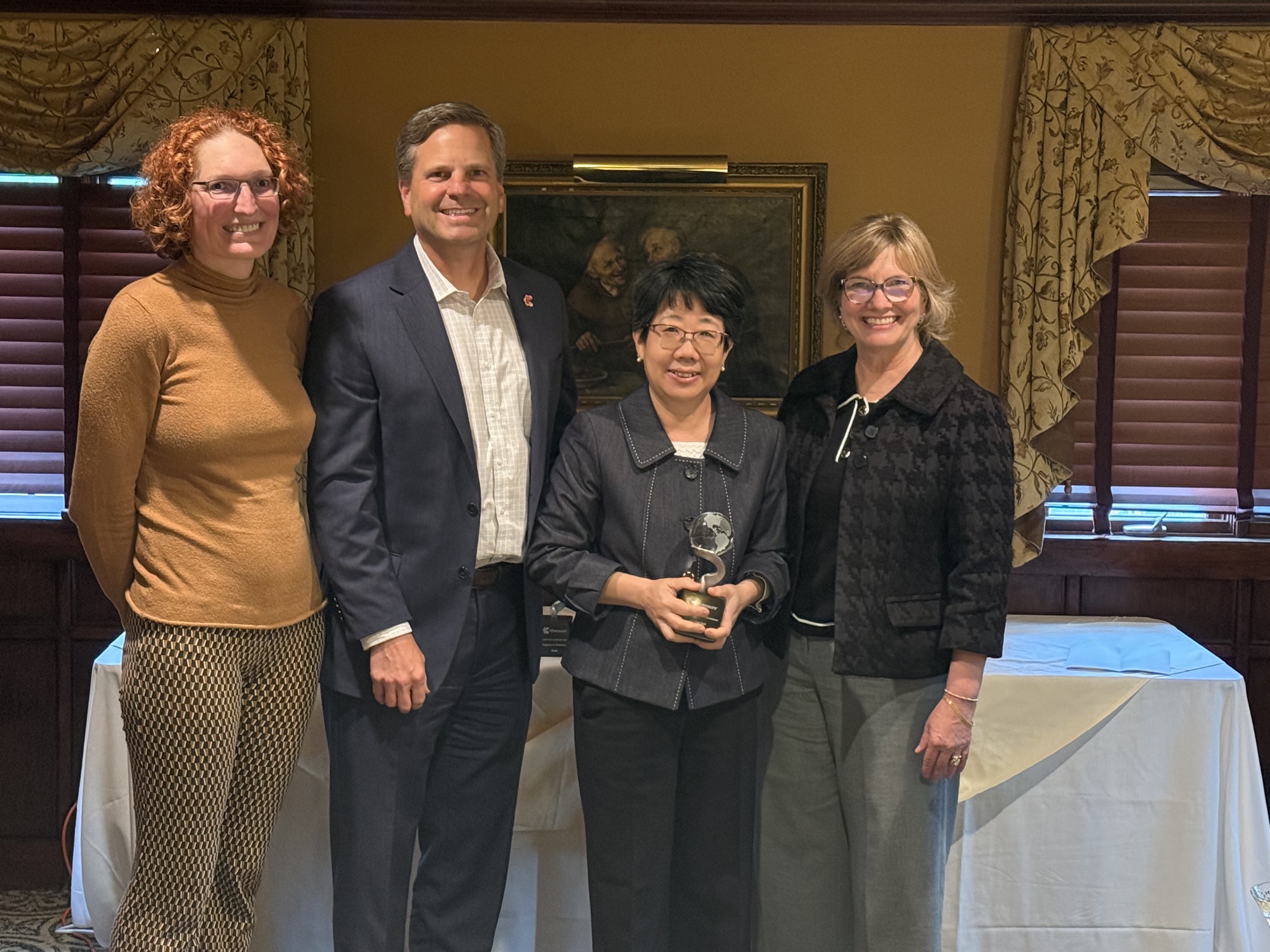 Xuehui Sun receiving award