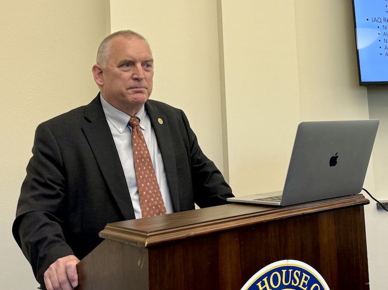 person speaking at podium