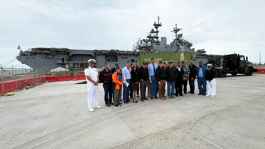 Group photo outside of USS Kearsarge Ship
