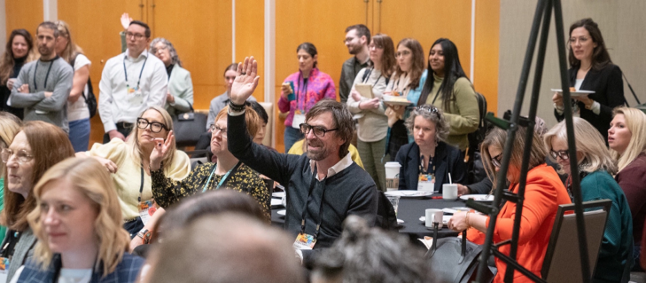 people asking questions at an event