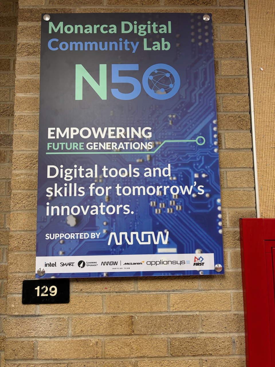 Sign reading "Monarca Digital Community Lab: N50"