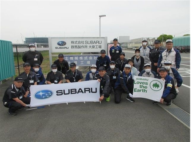 Volunteers behind banners