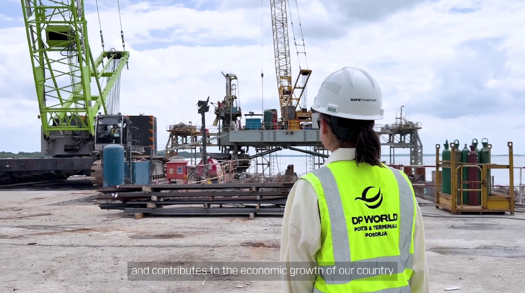 Alixon Ocampo, Site Project Manager at DP World, observes construction work during the expansion of the Port of Posorja in Ecuador.