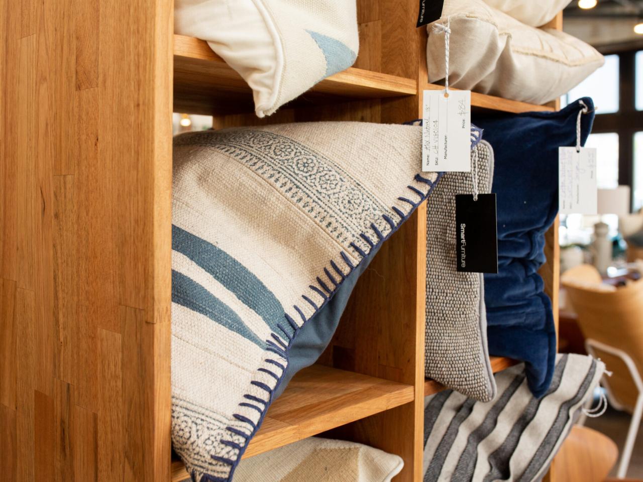 pillows on shelf in home furnishings store