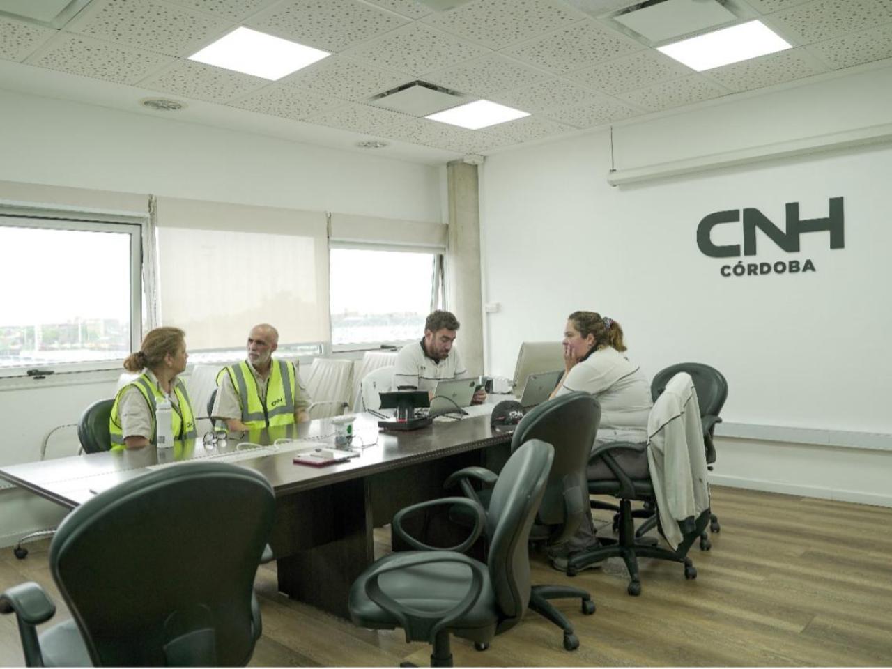 4 employees in a meeting room