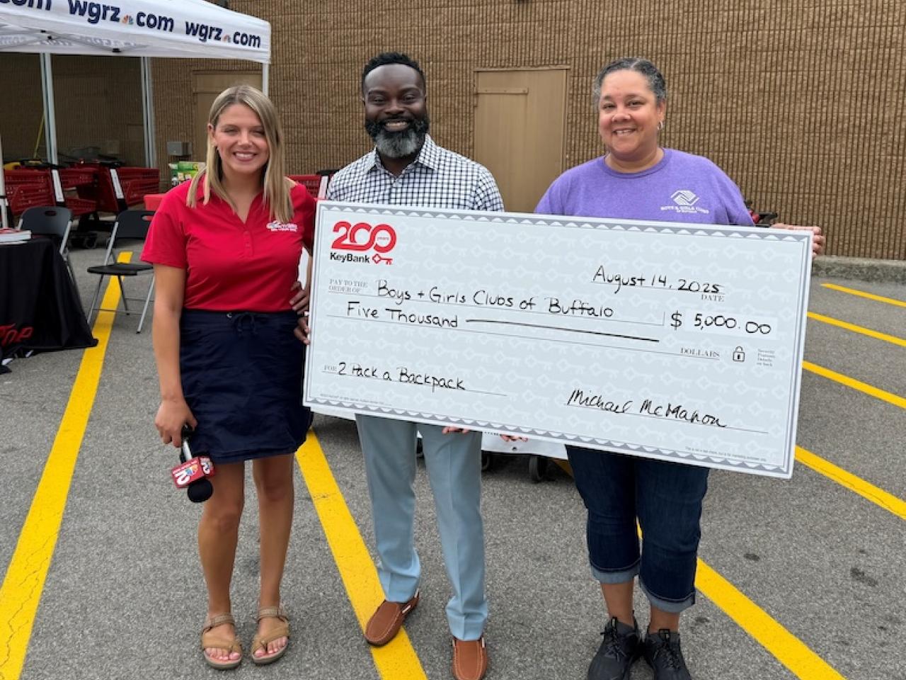 KeyBank and Boys & Girls Clubs of Buffalo shown with a $5,000 check.