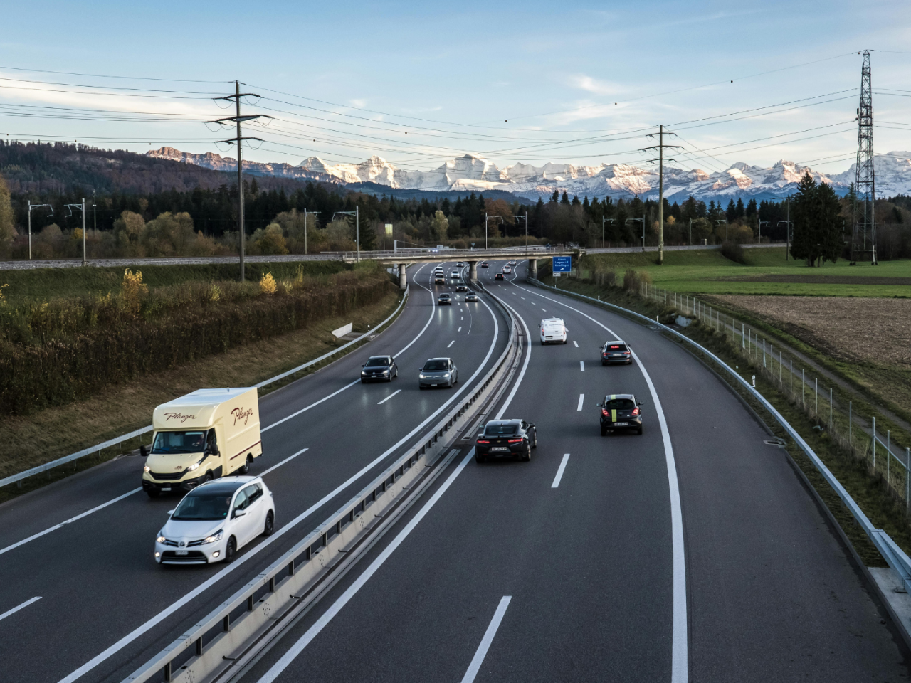 A highway with power lines in the background