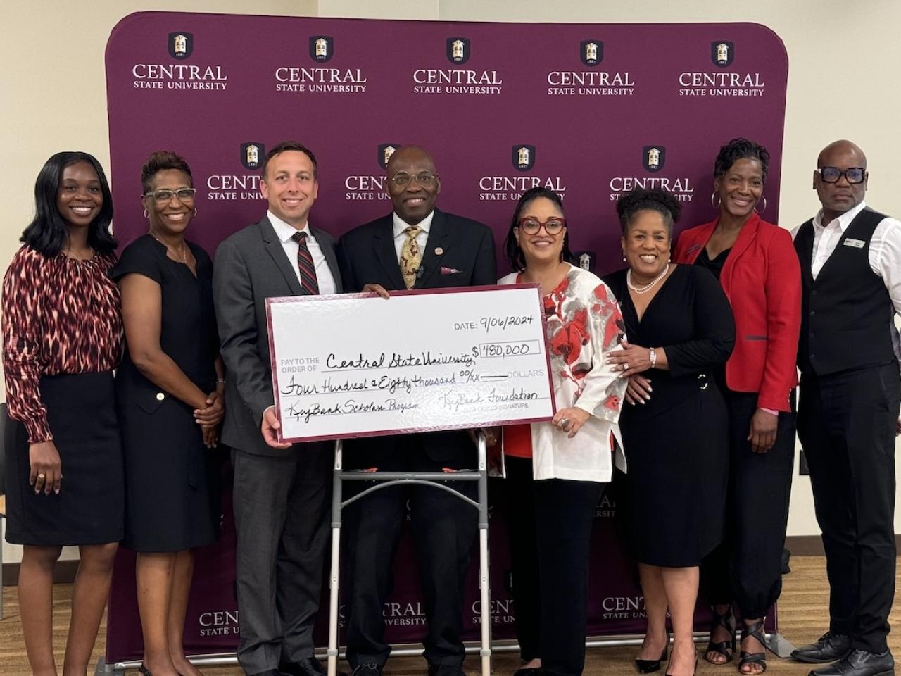 KeyBank and representatives from ,  Central State University shown with a $480,000 grant check.