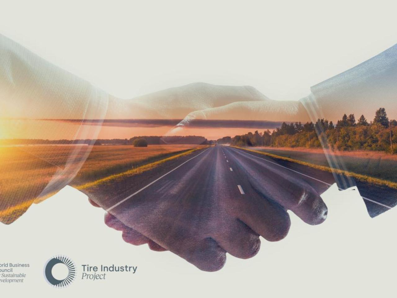 A handshake overlayed with a highway at sunrise