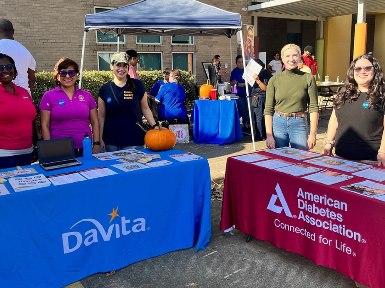 People behind DaVita and American Diabetes Association tables
