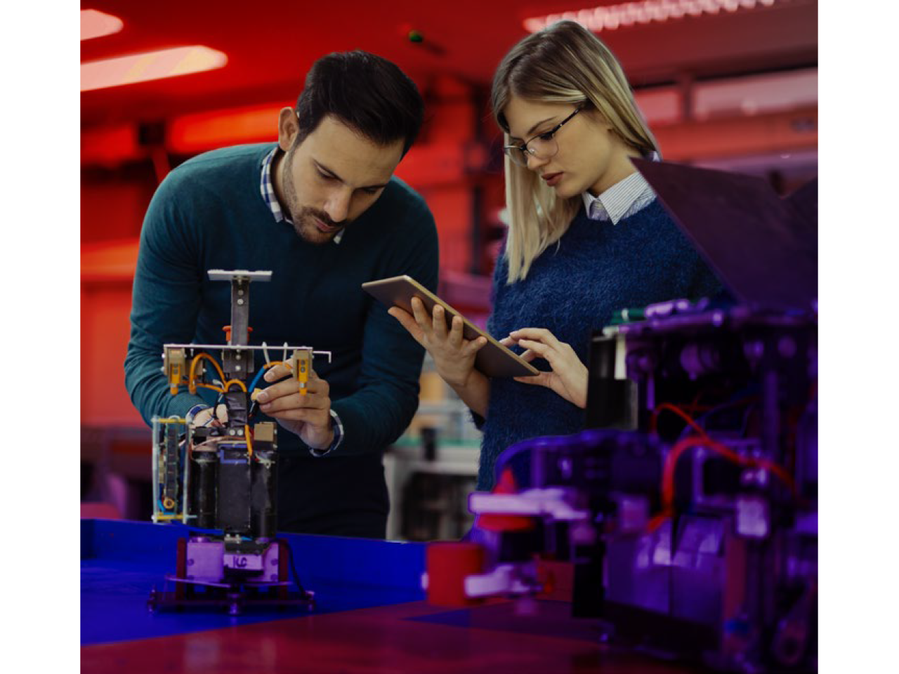 Two people working on a project together