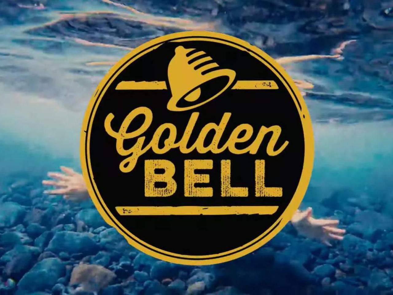 Golden Bell logo over an ocean scene