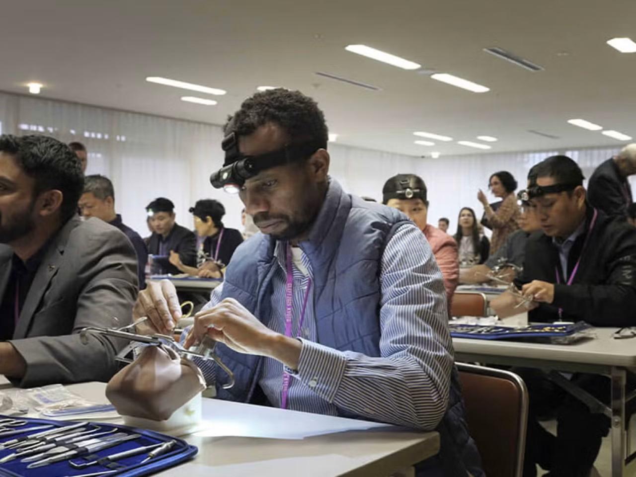 Smile Train partners take part in a Simulare workshop at Cleft 2025 in Kyoto, building practical surgical skills through simulation-based training and collaboration.