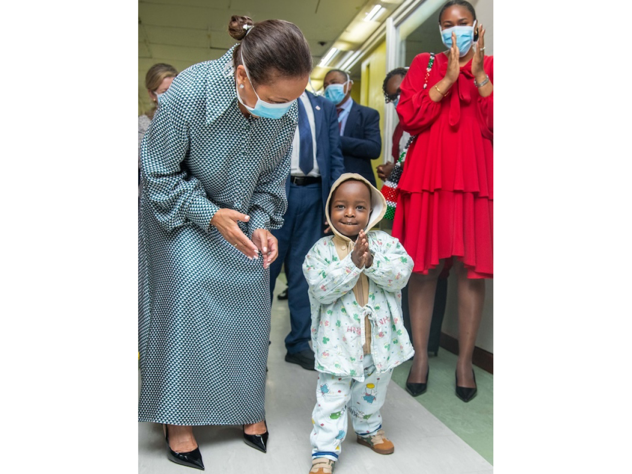 A young child shown in a healthcare facility in Africa.