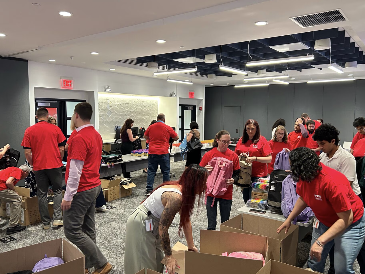 volunteers at back to school event
