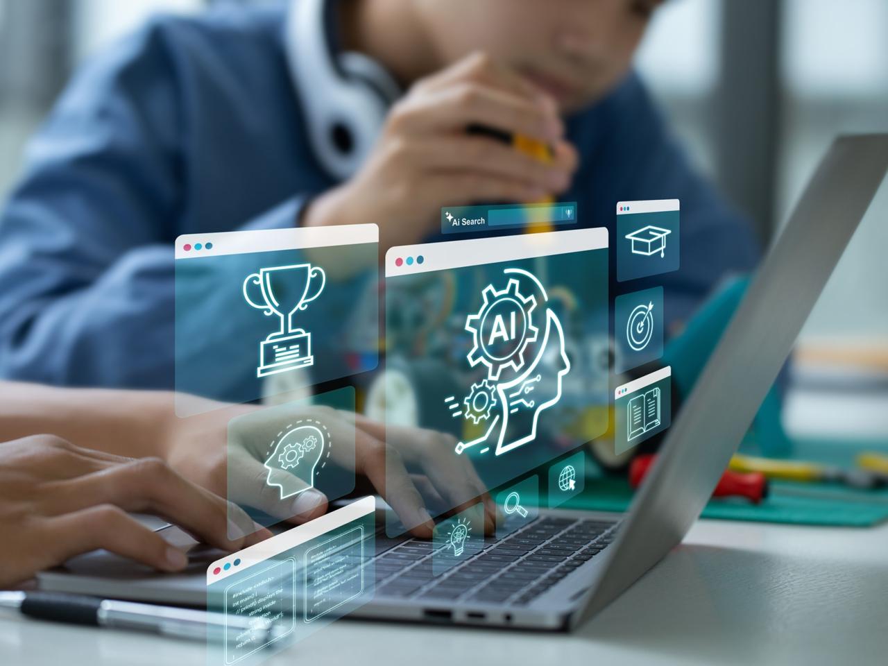 AI artificial intelligence, STEM. Teenage students engage in hands-on STEM education, building robots and learn to use artificial intelligence through coding and programming.