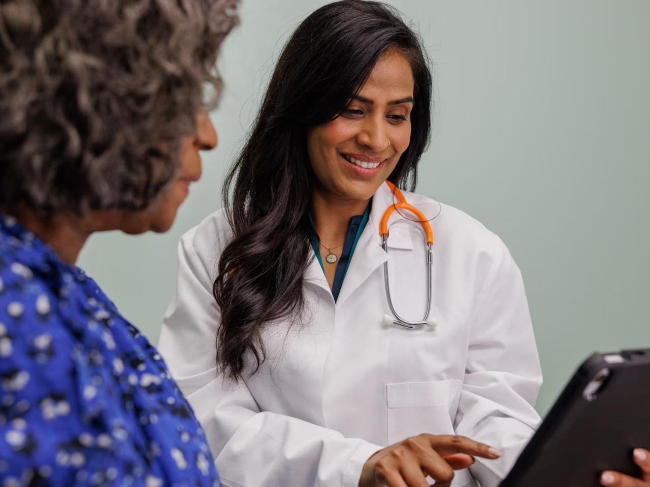 healthcare provider speaking to patient