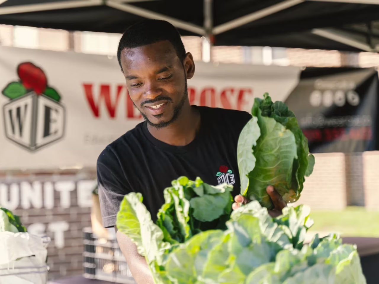 DaQuan Campbell holding cabbages
