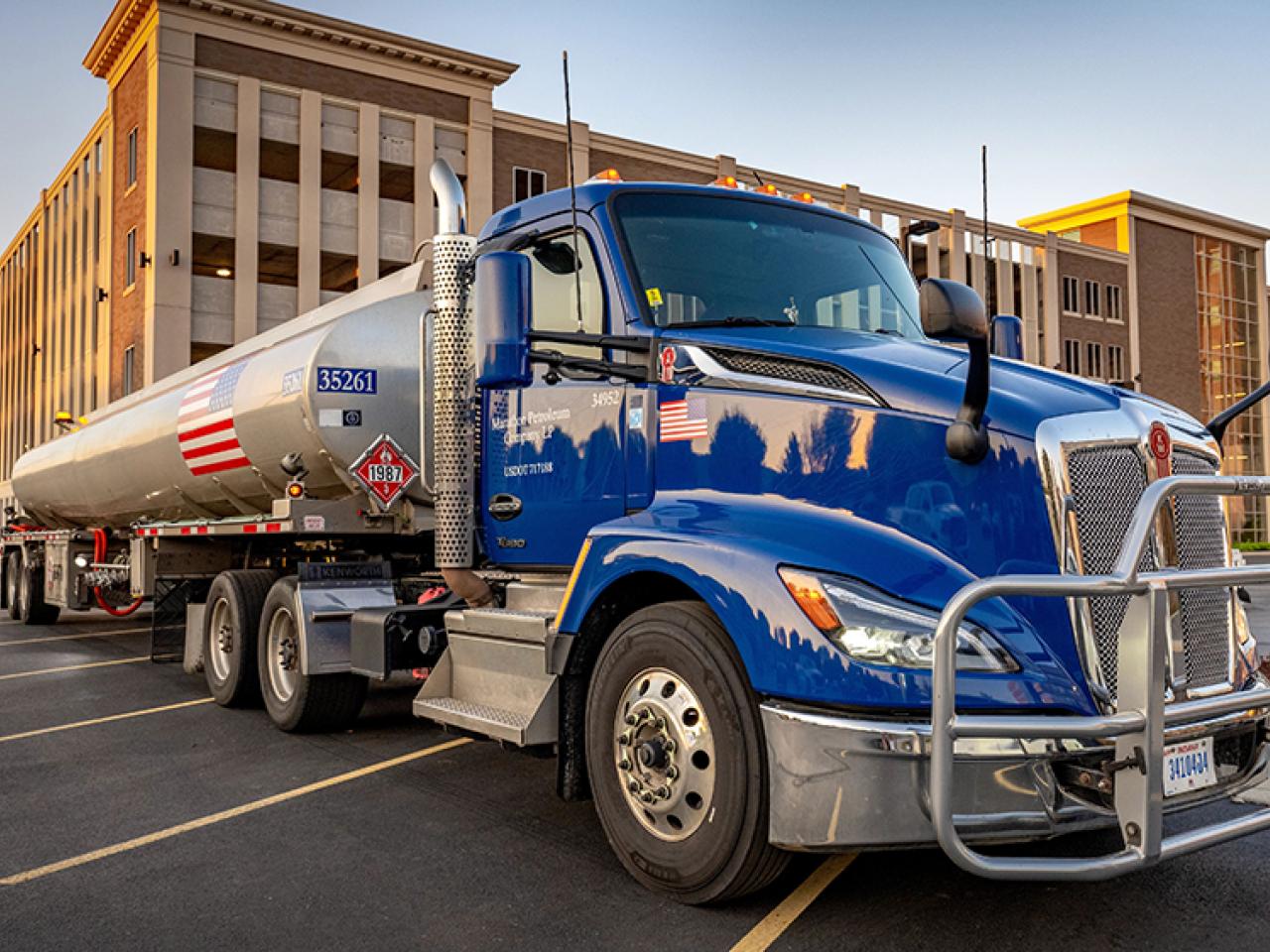 18 wheeler parked in front of a building