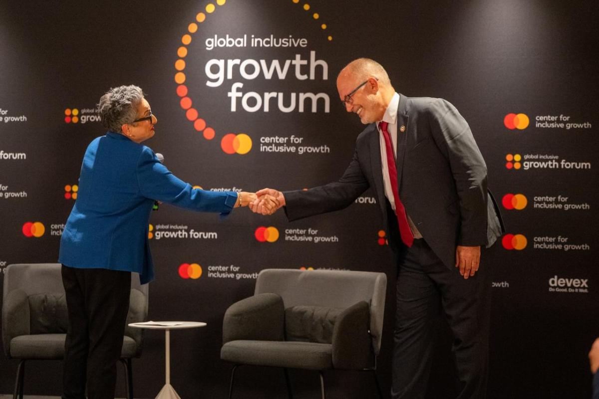Woman and man shaking hands 