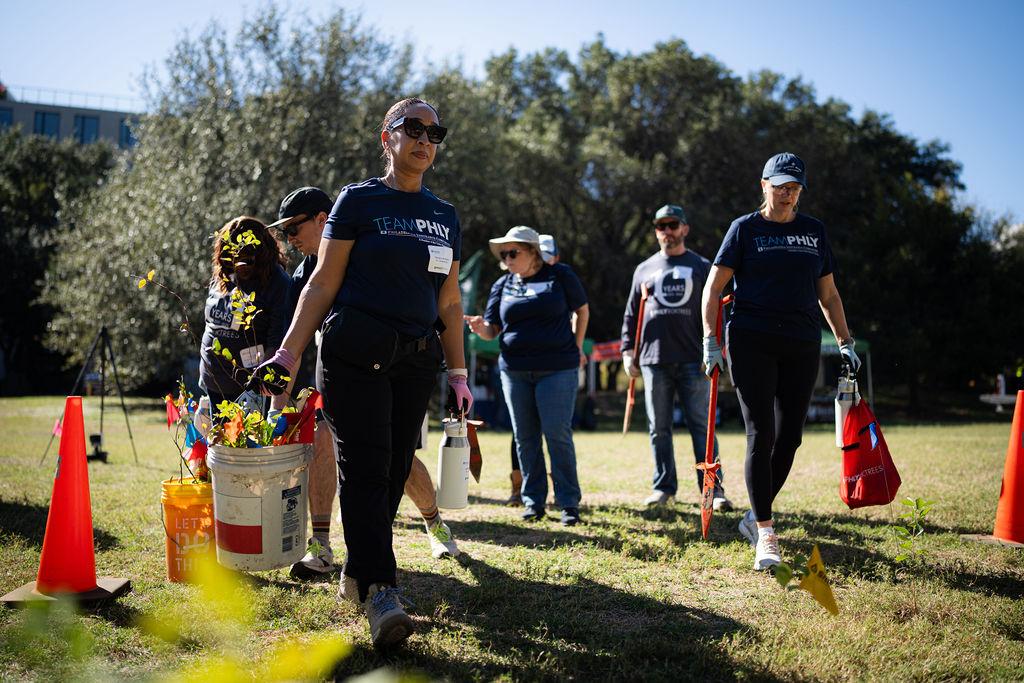 40 PHLY employees from across the country gathered in Austin, Texas, this week for a community tree planting event.