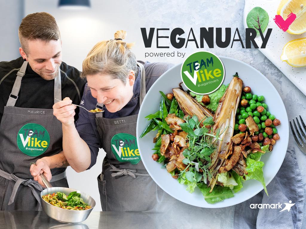 2 chefs sample vegan food. Next to them is a bowl of vegan food with text reading, “Veganuary”