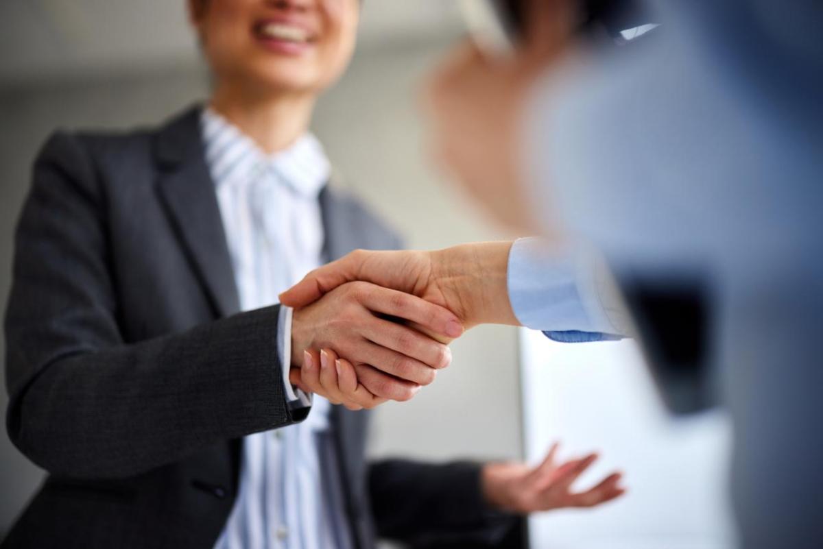 Close up of a handshake