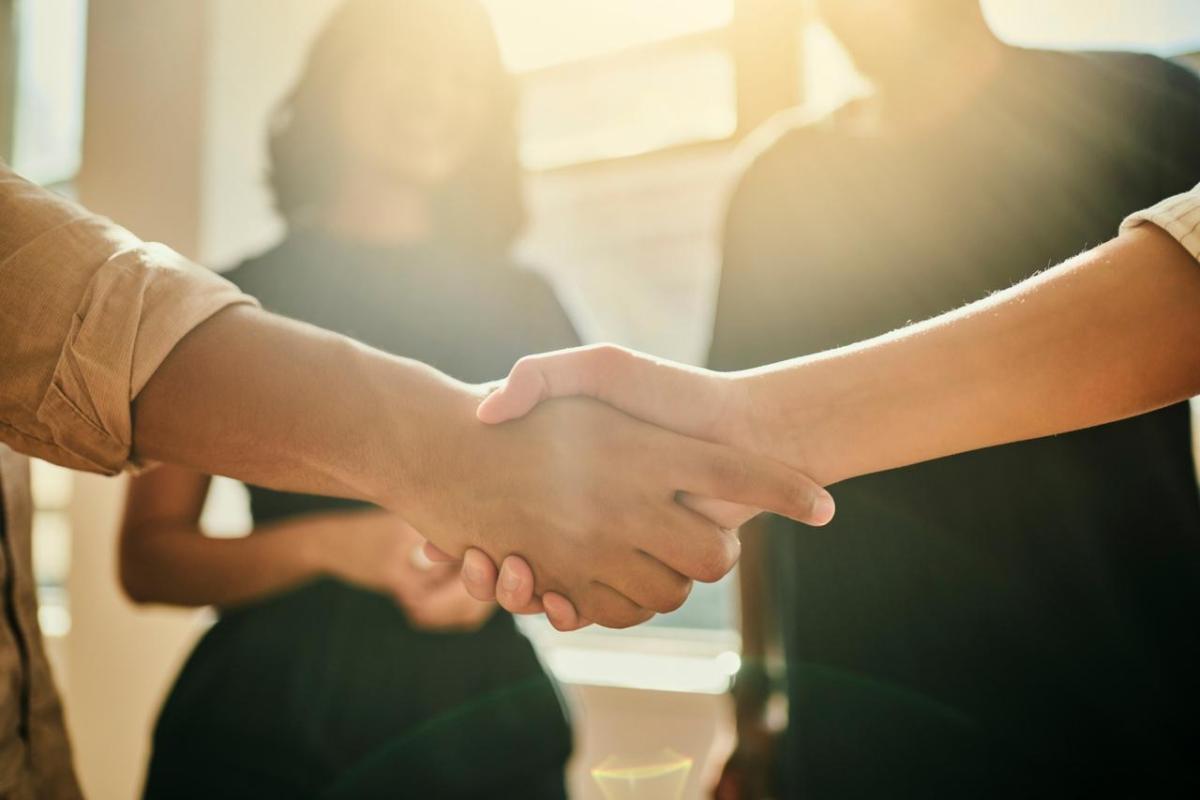 Close up of a handshake