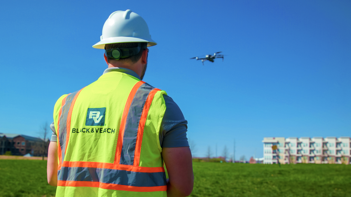 Black & Veatch technician piloting a drone vehicle.