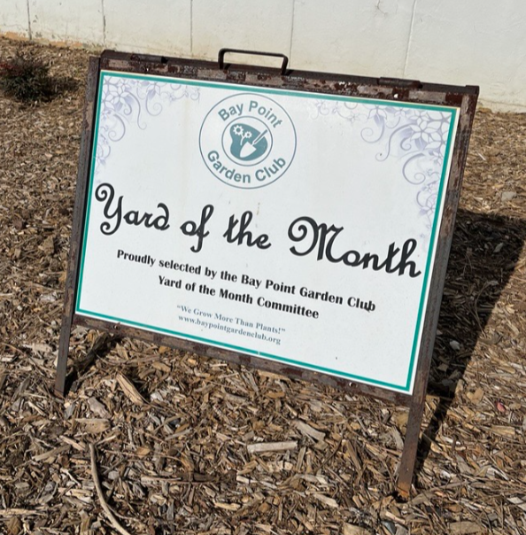 lawn sign reading Yard of the Month