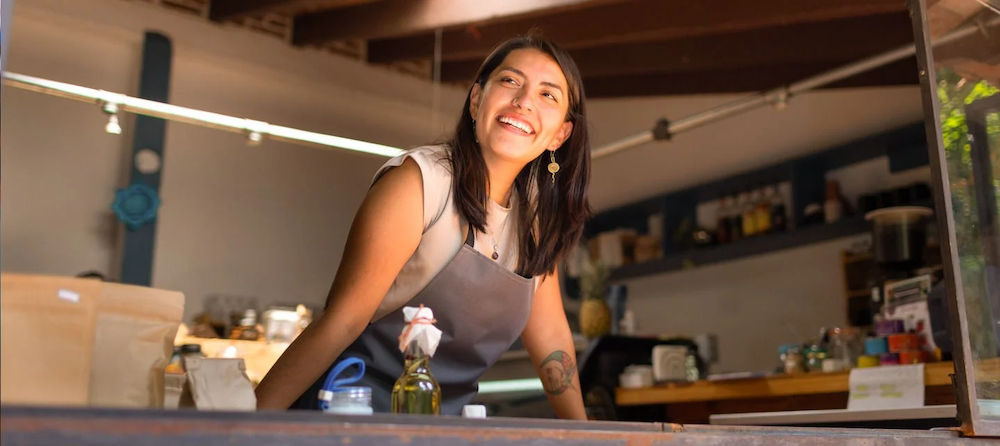 A woman in an apron.