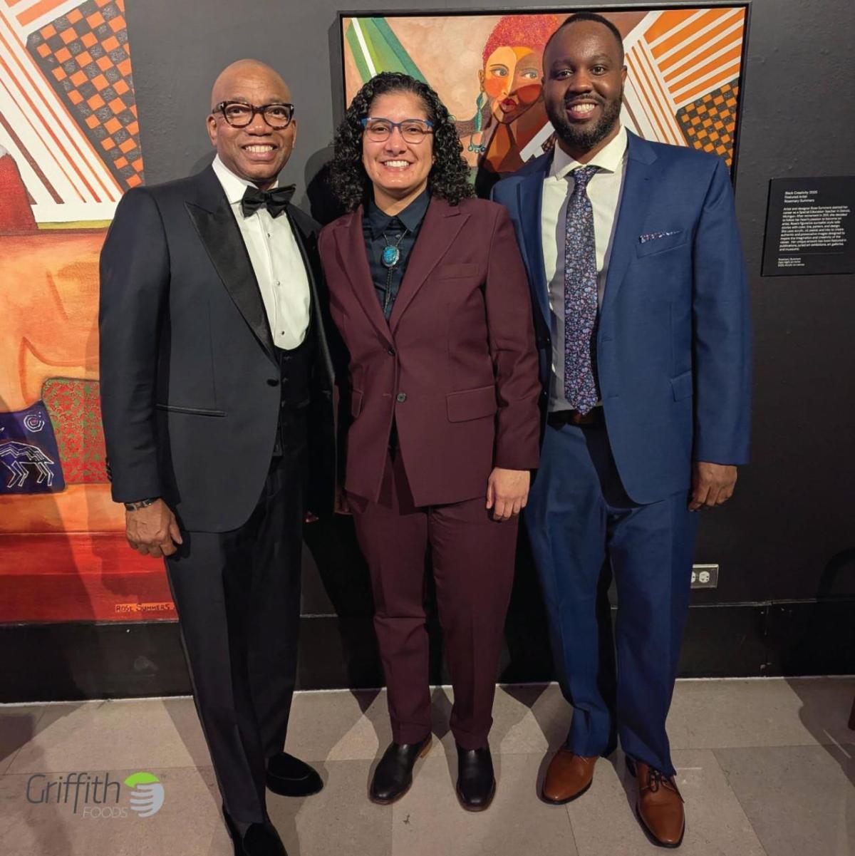 3 people at the 2025 Black Creativity Gala pose for a picture