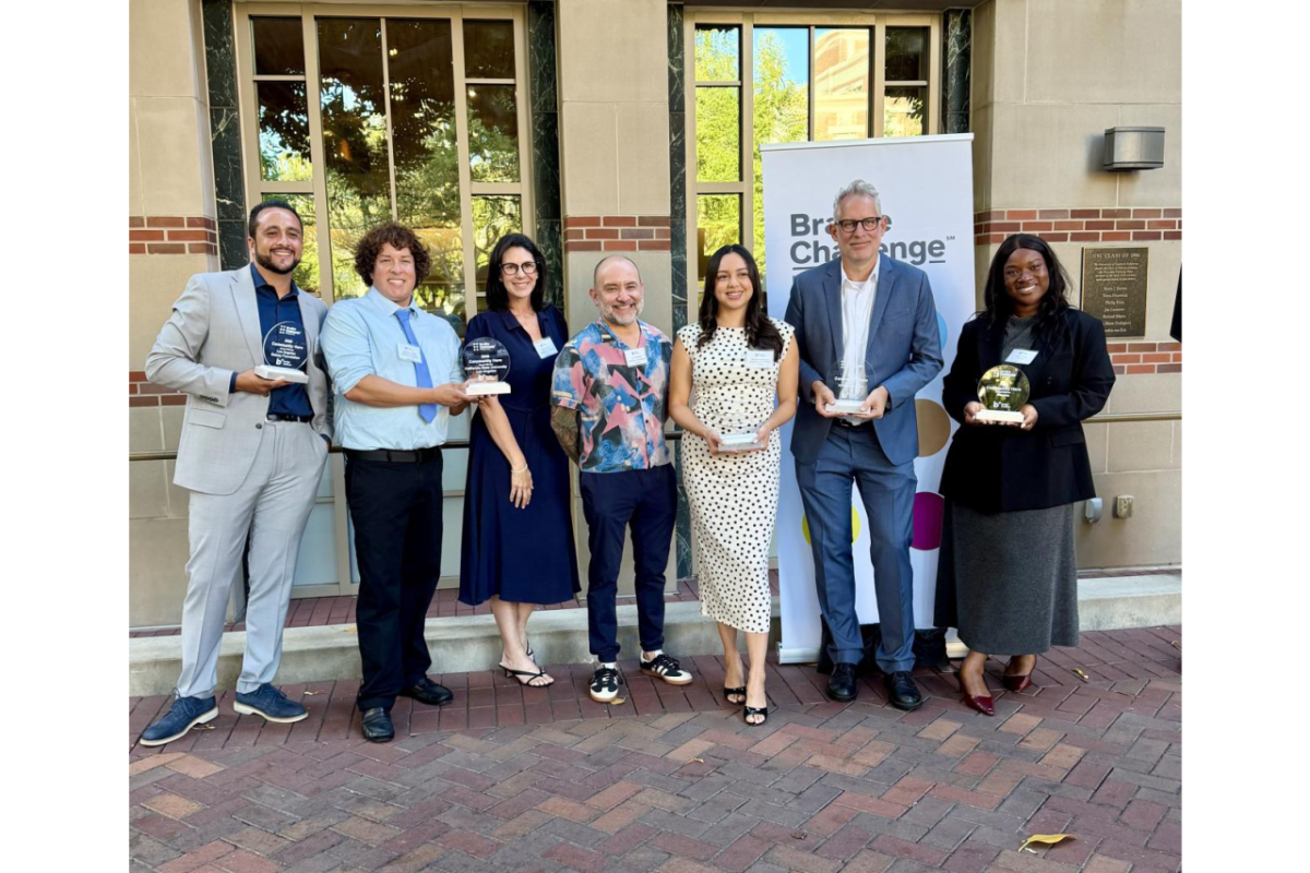 Braille Institute award recipients pose with trophies